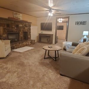 Homestead House Living Room Homestead House Living Room at Rustic Ridge Guest Cabins