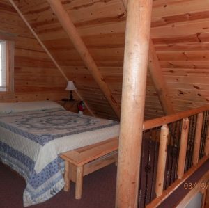 Bedroom 2 Pine Lodge Bedroom at Rustic Ridge Guest Cabins