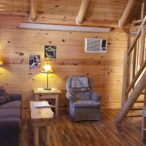 Living Room Hunters Haven Living Room at Rustic Ridge Guest Cabins