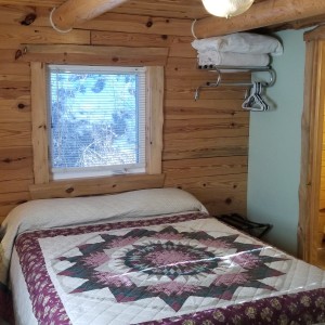 Bedroom 1 Hunters Haven Bedroom at Rustic Ridge Guest Cabins